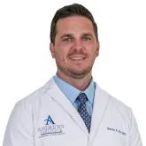 Dr. Kevin E. Fox